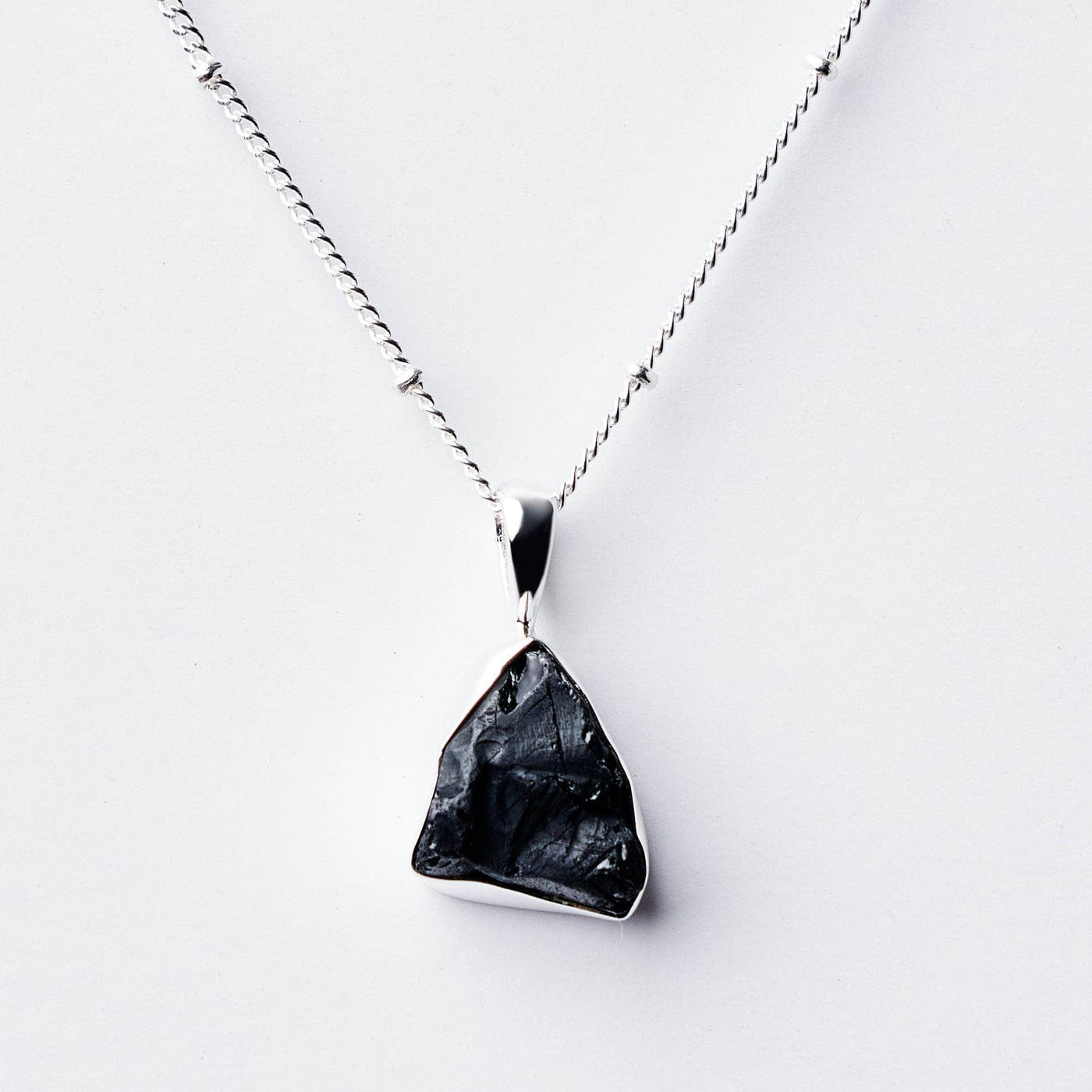 Black Tourmaline Raw Crystal Necklace by Tiny Rituals